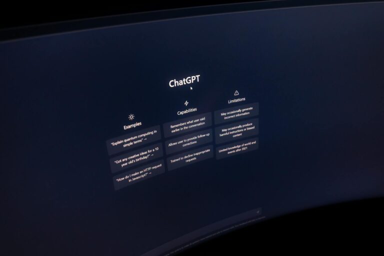 Top AI Tools for Network Monitoring in 2026 Close-up of a computer screen displaying ChatGPT interface in a dark setting.