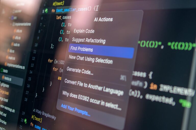 How to Use AI to Analyze Log Files Close-up of AI-assisted coding with menu options for debugging and problem-solving.
