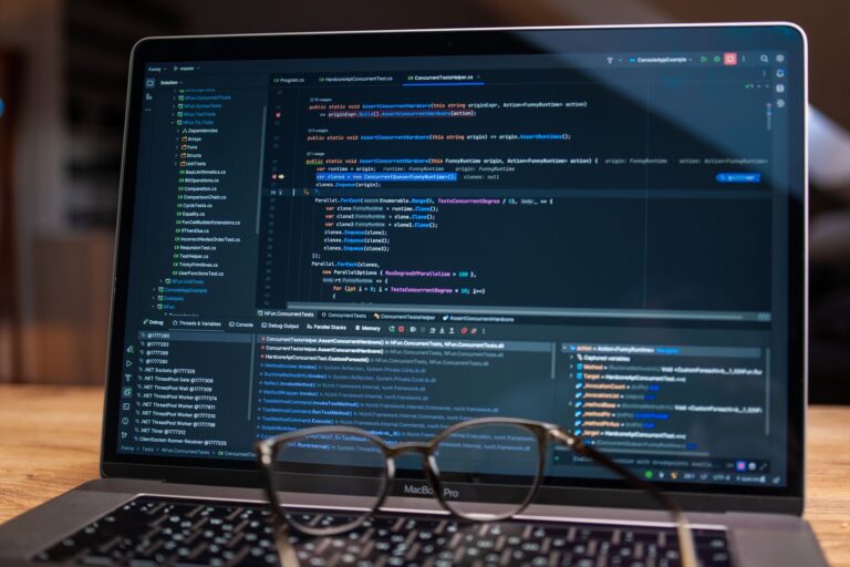 Best Infrastructure as Code Tools in 2026 Laptop screen showing debugging software with code, perfect for tech and software development themes.