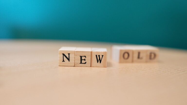 Ansible vs Puppet vs Chef: Which is Best in 2026 Wooden blocks displaying the words 'NEW' and 'OLD', symbolizing change.